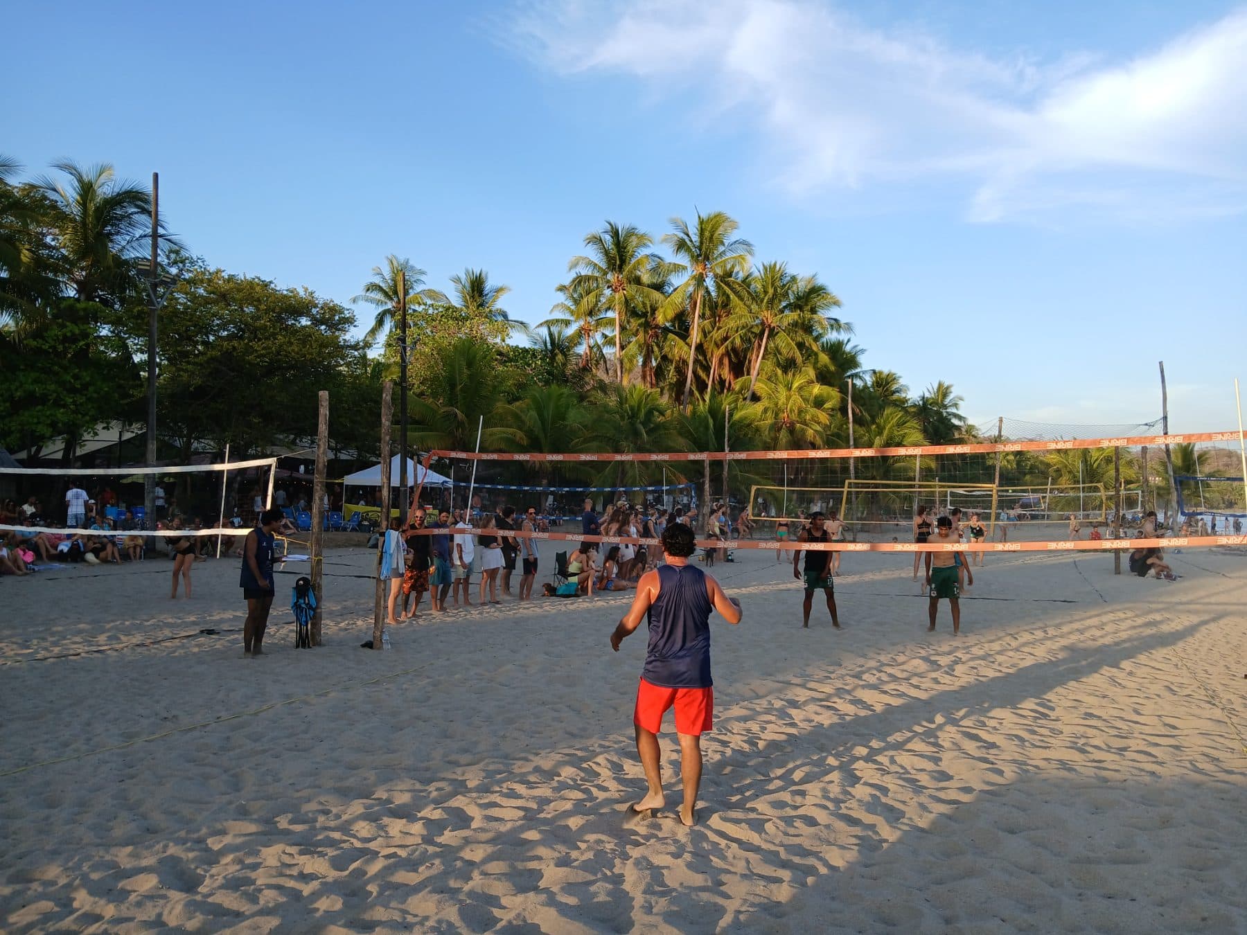 Serving into the sunset